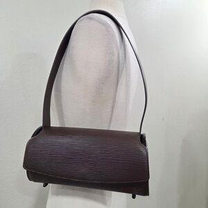 Louis Vuitton Nocturne PM shoulder bag in Moka Epi leather.